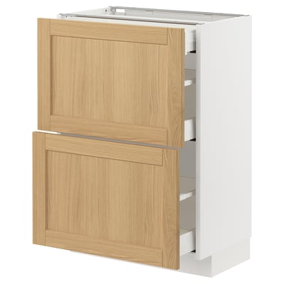 METOD kitchen cabinet with oak veneer, white frame, and three drawers.