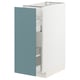 A modern kitchen cabinet with turquoise doors and a white frame. It sleek drawers and a minimalist design.