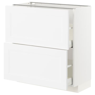 A white METOD kitchen cabinet with two drawers. It has a sleek, modern design.