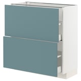 Turquoise blue modern kitchen cabinet with sleek, white finish and smooth drawers.