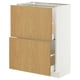 This image an IKEA METOD kitchen cabinet with light wood drawers and white framing. It has two pull-out drawers, ideal for storage.