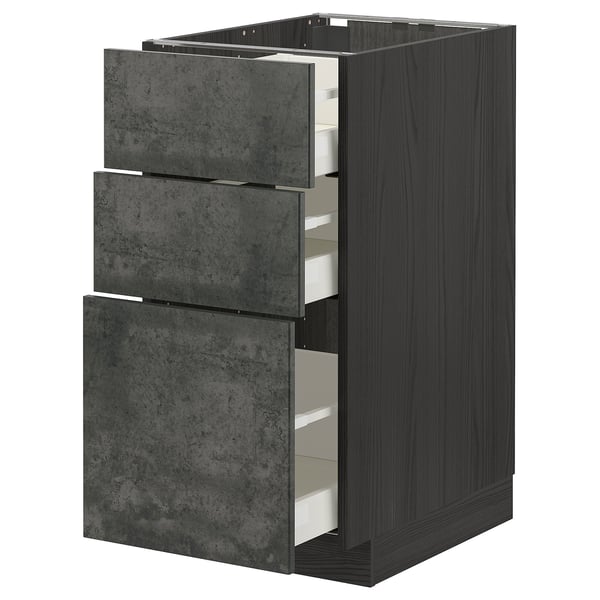 A dark gray METOD kitchen cabinet with three open drawers. The cabinet is made of particleboard and has a sleek, modern design.