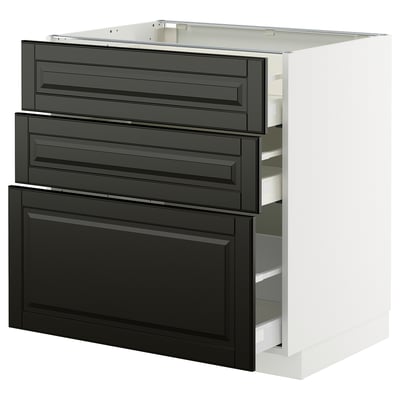 A white METOD kitchen cabinet with black bodbyn drawer fronts in a modern design.