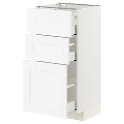 An all-white METOD kitchen cabinet with multiple drawers and shelves.