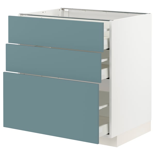 A modern METOD kitchen unit with three turquoise drawers and a white base.