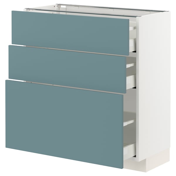 A modern kitchen cabinet with turquoise drawers and a white frame, featuring a sleek and minimalist design.