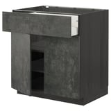 Modern grey kitchen cabinet with drawers, sleek design, dark finish.