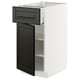 METOD white kitchen unit with black drawer and door, modern design.