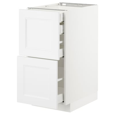 White METOD kitchen cabinet with pull-out drawers.