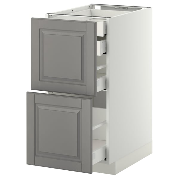 Modern kitchen unit, white with grey drawers, traditional style.