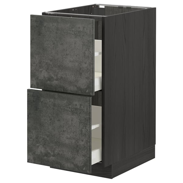 Dark grey modern kitchen cabinet with concrete-effect drawers and sleek design.