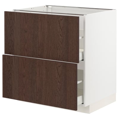 Ikea METOD kitchen unit, dark brown sinarp wood, white framework, two drawers open.