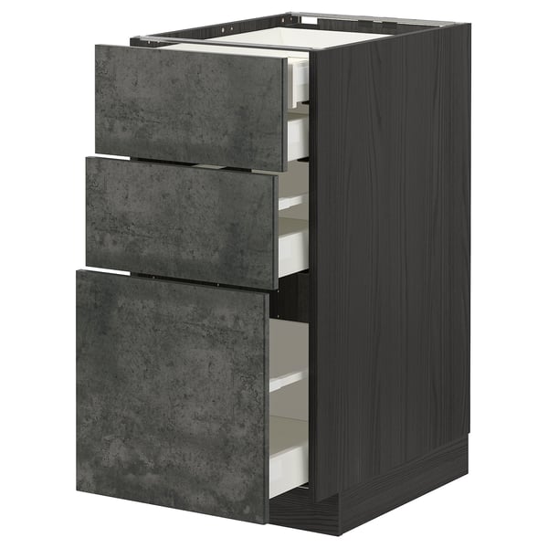 A dark grey modern METOD kitchen cabinet with three open concrete-effect drawers.