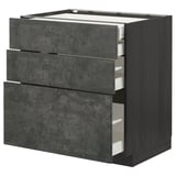 An open dark grey ikea METOD kitchen cabinet with three drawers, featuring a clever design and urban look.