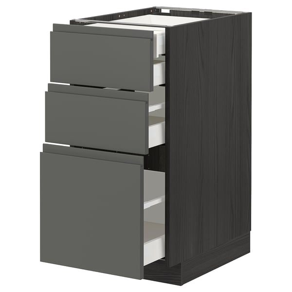Modern dark grey kitchen cabinet with three drawers. Integrated handles, sleek design, sturdy construction.