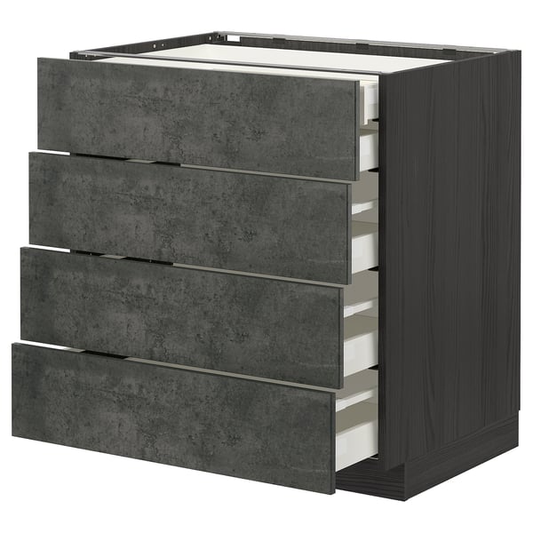 The METOD kitchen unit four dark grey concrete effect drawers. Its modular design offers robust storage with a modern, urban appeal.
