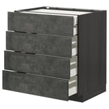 The METOD kitchen unit four dark grey concrete effect drawers. Its modular design offers robust storage with a modern, urban appeal.