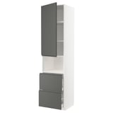 A modern, tall white kitchen cabinet with dark gray drawers and doors, featuring sleek, seamless design and built-in handles.
