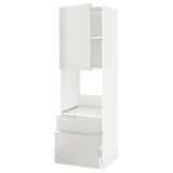 A white METOD kitchen cabinet with a modern design. It a high gloss door and drawer fronts, a fixed ventilated shelf, and adjustable storage space.