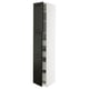 A tall, sleek, black and white kitchen cabinet with beveled edges and a full extension drawer. Modern, minimalist design.