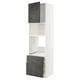 Modern, tall white kitchen cabinet with dark grey concrete effect doors, one open.