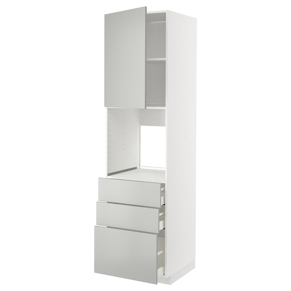 A white METOD kitchen cabinet with light grey drawers and a closed top section.