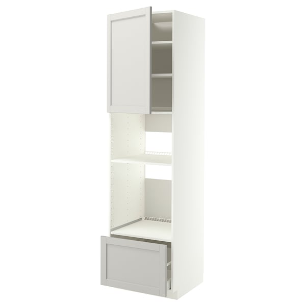 White METOD kitchen unit with open door, drawer, and shelf.