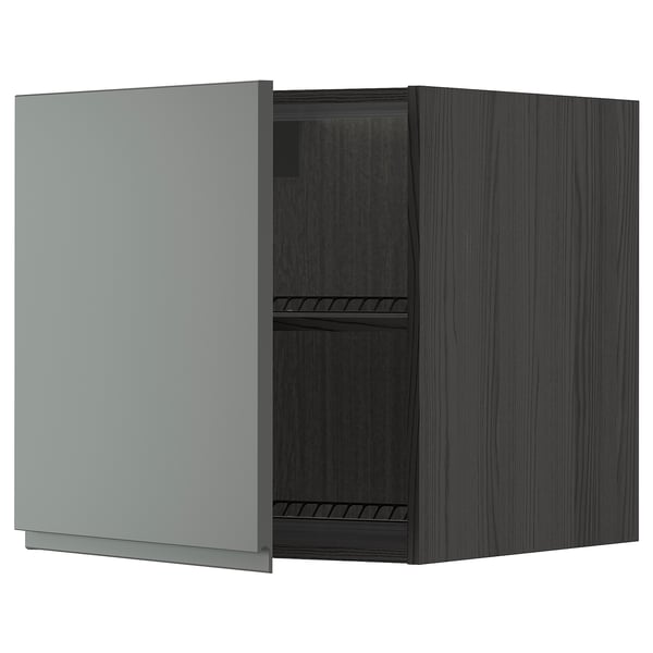 A modern dark grey METOD kitchen cabinet with one open door, exposing internal shelves.