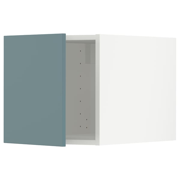 METOD kitchen with turquoise havstorp doors featuring modern design and smooth surfaces.