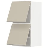 Two beige METOD kitchen wall cabinets with angled doors in a minimalist design.