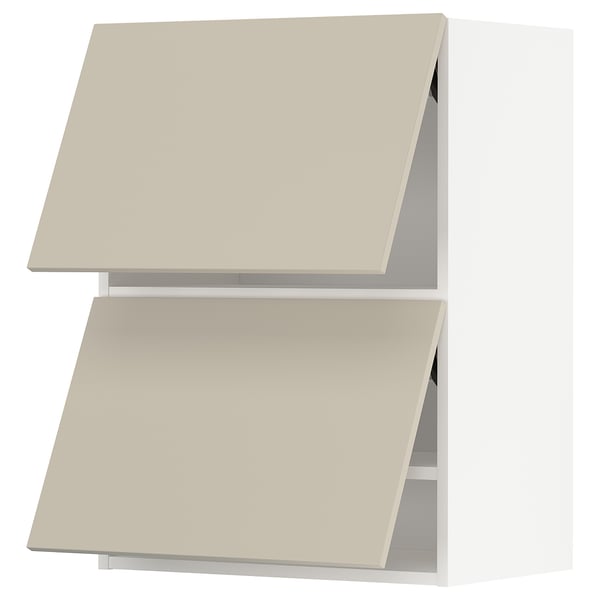 Two light beige METOD kitchen cabinets with angled doors, simple modern design.