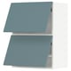 Two triangular turquoise kitchen cabinets, sleek design, modern smooth finish.