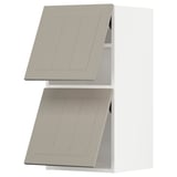Two beige METOD kitchen cabinets with flat panel doors and angled tops, arranged vertically.