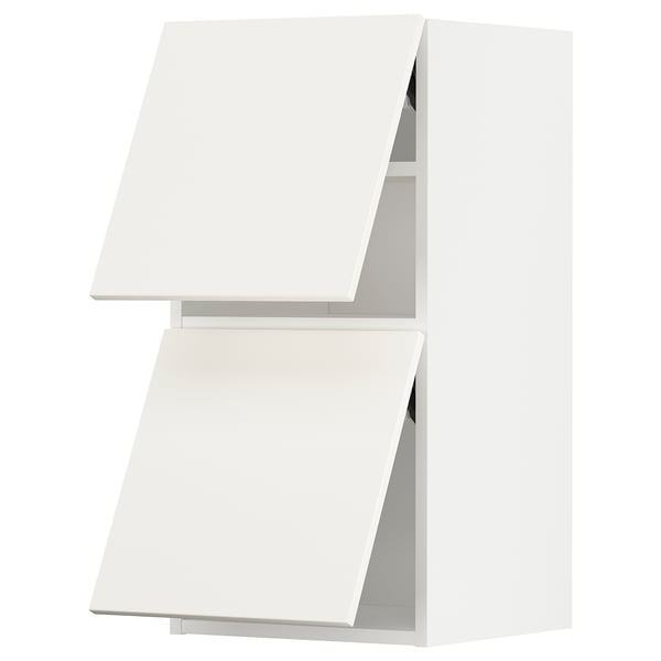 A white METOD kitchen cabinet. It a sleek, modern design with smooth surfaces and a sturdy construction.