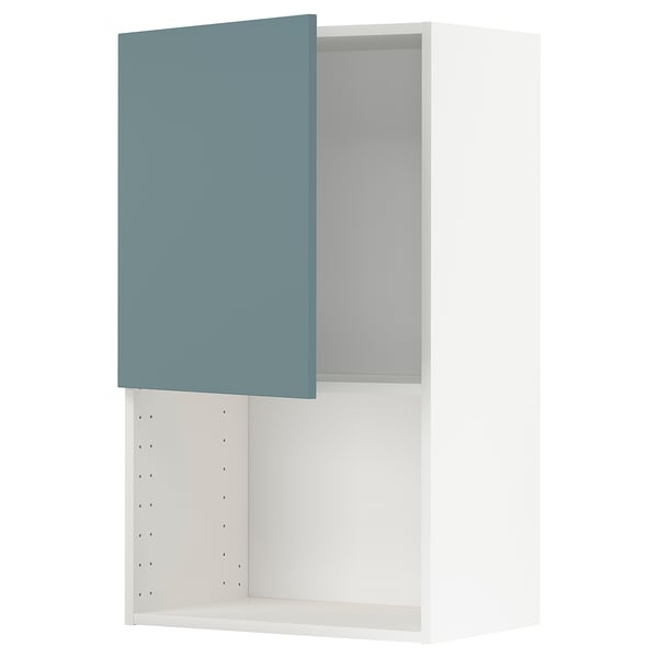 Turquoise kitchen cabinet with white shelf, modern design.