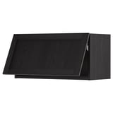 Black kitchen cabinet with beveled edges, sleek, rectangular, and modern design.