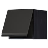 METOD kitchen unit in matte black with angled door.