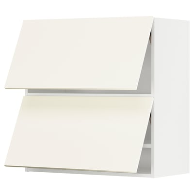 White METOD kitchen cabinet with slanted doors.