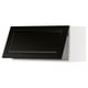 METOD kitchen unit with black beveled door.