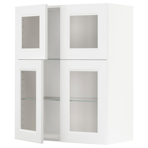 White METOD kitchen cabinet with glass doors and shelves.