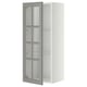 A white METOD wall cabinet with grey glass doors, featuring beveled edges and adjustable shelves.