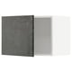 A side-by-side comparison of dark grey concrete effect kitchen cabinet doors. One is open, revealing its interior.