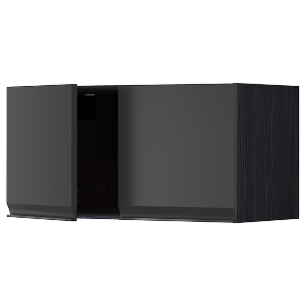 A modern black wall-mounted cabinet from ikeas METOD kitchen system, featuring sleek edges and a minimalist handle.