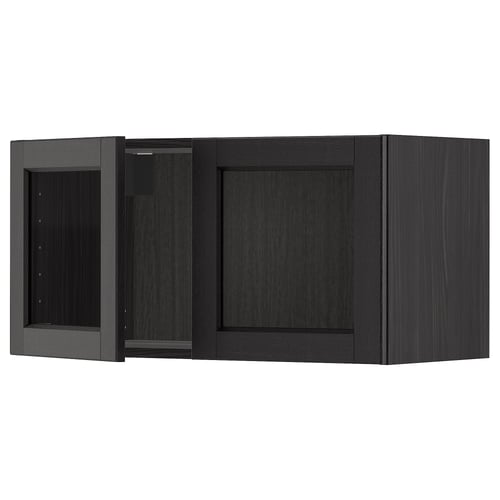Black kitchen cabinet with glass door, wooden frame.