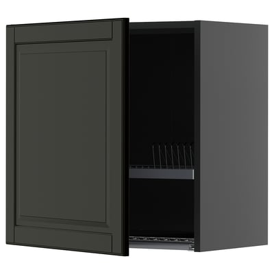 Dark green wall-mounted kitchen cabinet with one door open, revealing wire dish racks inside.