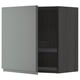 A modern, dark grey kitchen cabinet with a light grey door slightly ajar, revealing a dish drainer inside. It a sleek, contemporary design.