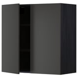 A modern black METOD wall cabinet with one open door, revealing an empty shelf inside.
