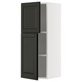 Black METOD kitchen cabinet with beveled doors.