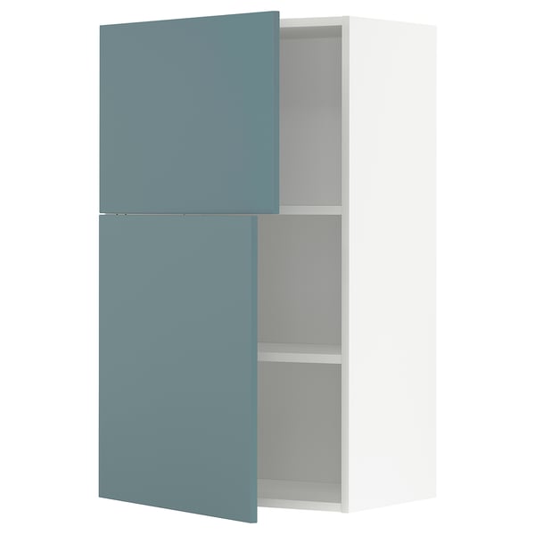 Turquoise METOD cabinet, modern design, two shelves, adjustable, sleek look.