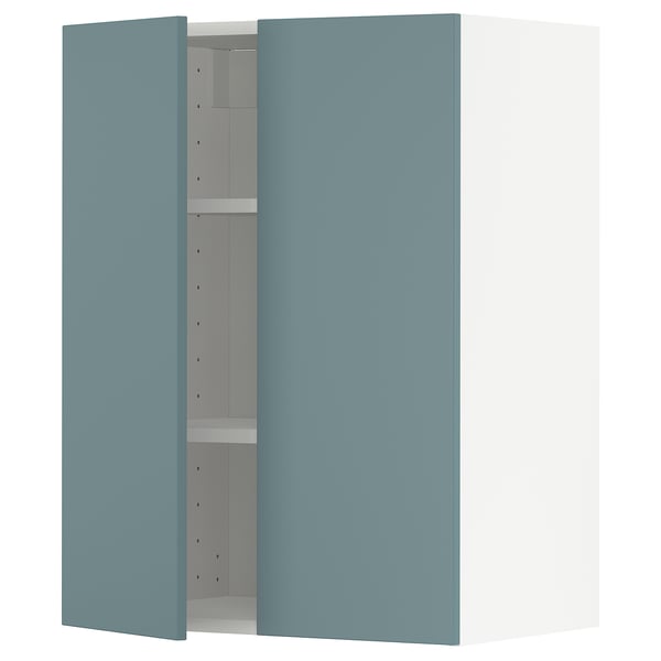 Blue METOD kitchen cabinet with adjustable shelves.